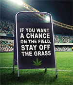 Billboard on field saying: If you want a Chance on the Field, Stay off the Grass